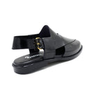 Premium Black Peshawari for the Modern Gentleman.