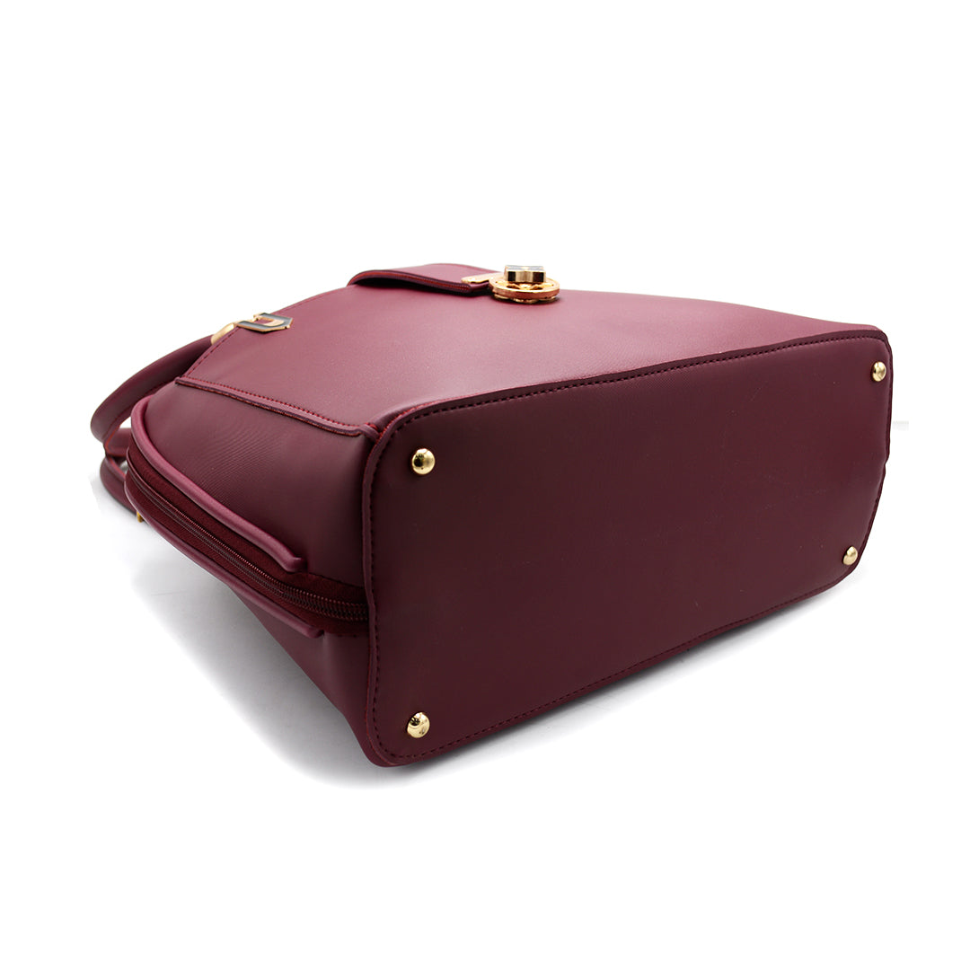 Elegant Maroon Handbag with Gold Accent Lock