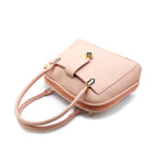 Elegant Pink Handbag with Gold Accent Lock