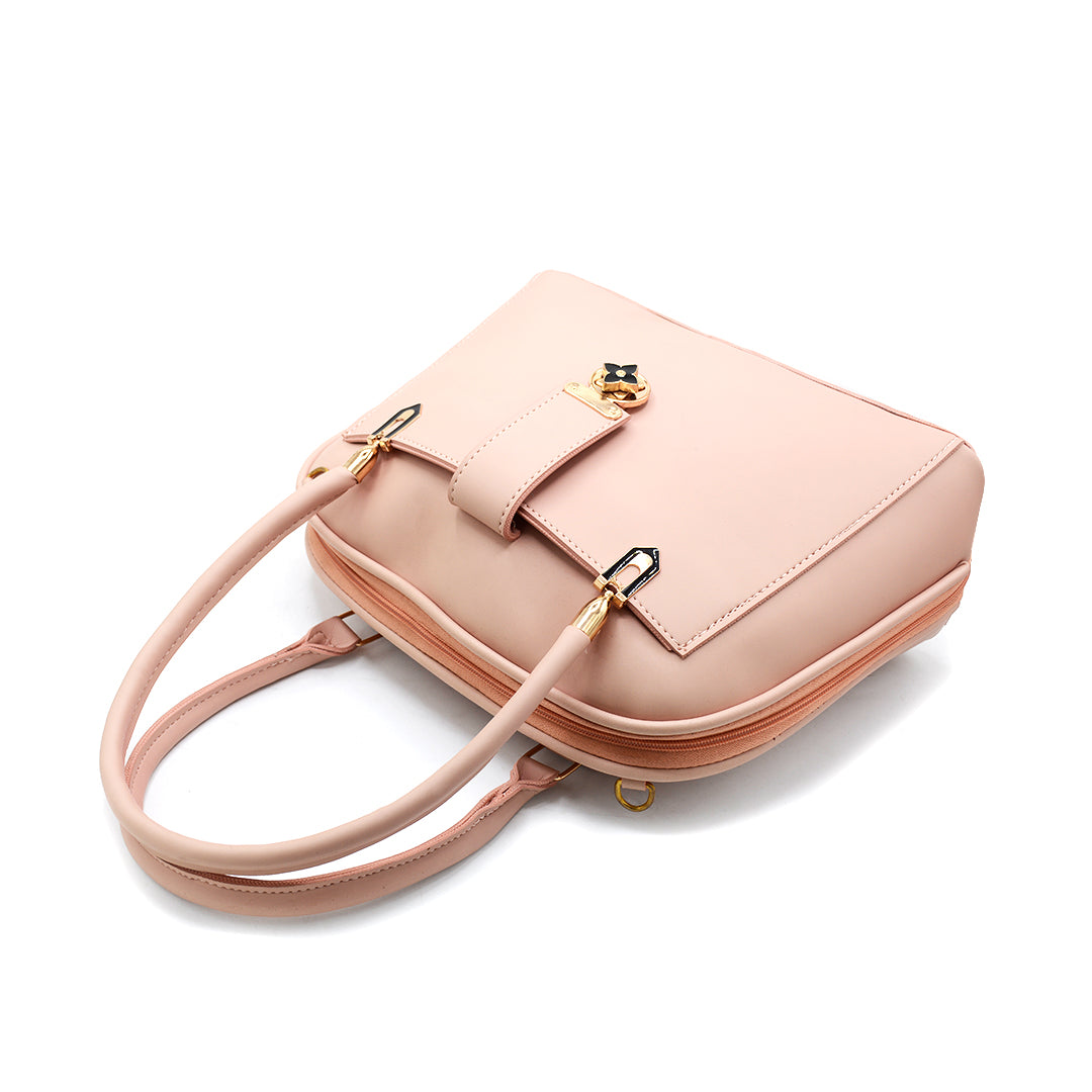 Elegant Pink Handbag with Gold Accent Lock