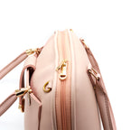 Elegant Pink Handbag with Gold Accent Lock